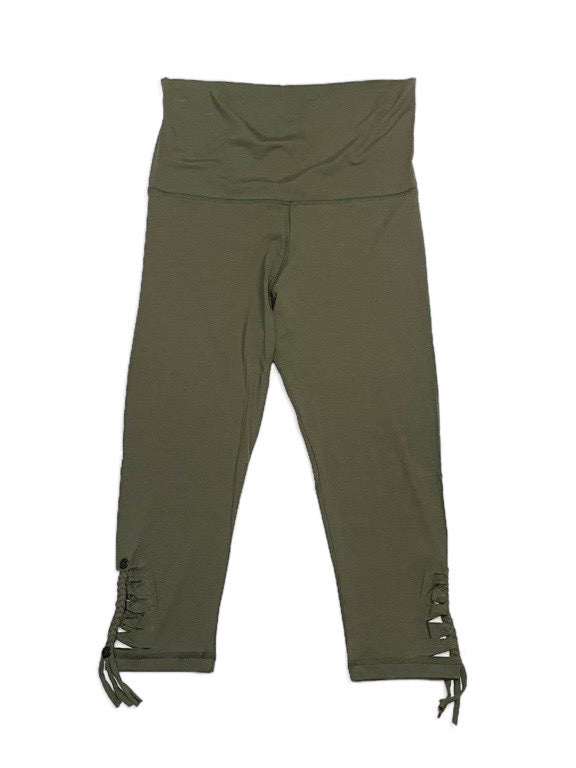 3/4 green leggings with Hem detail and buttons.