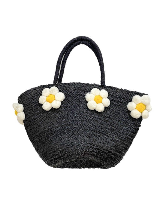 Black basket with pom-pom flower trim