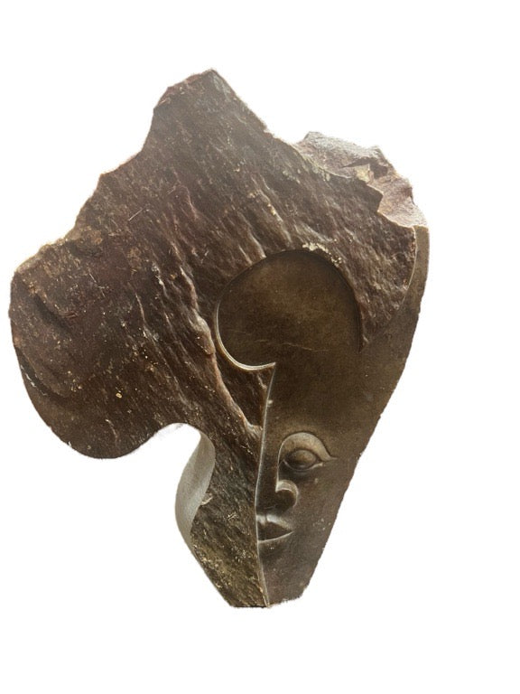 CARVED FACE ROCK ART