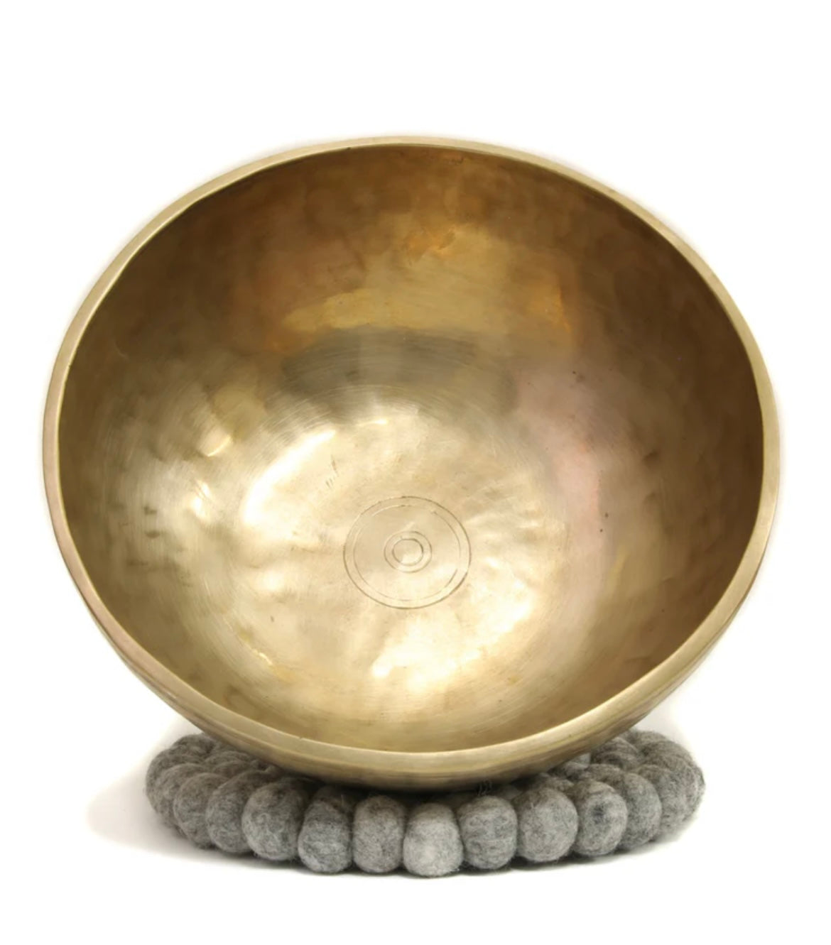 Bronze singing bowl on a white background