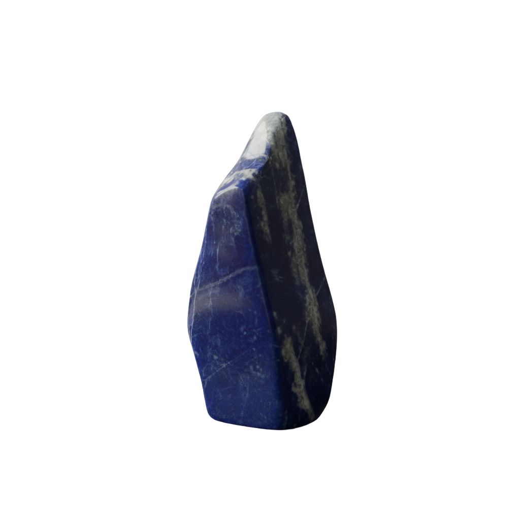 Blue stone on a reflective surface with a blurred indoor background