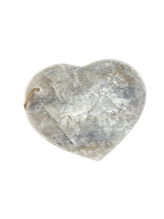Heart-shaped crystal on a white background