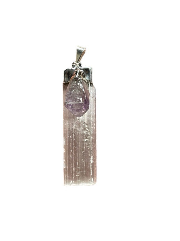 Crystal pendant with silver chain on a white background
