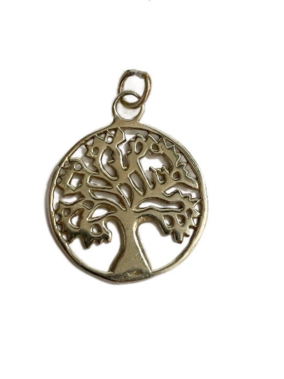 Silver tree of life pendant on a white background