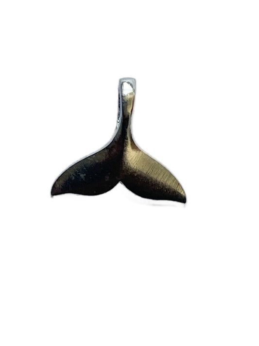 Whale tail pendant on a white background
