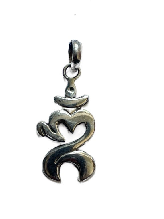 Silver pendant with a unique design on a white background