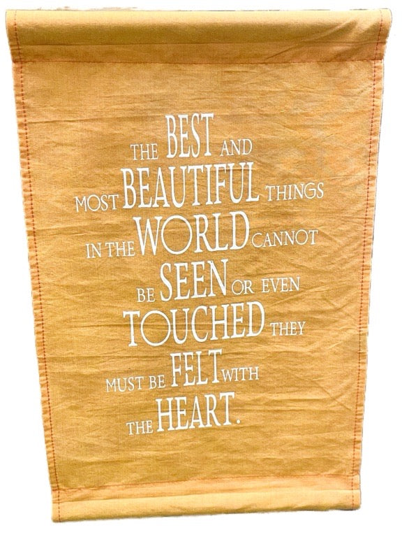 Textile with a quote on a yellow background