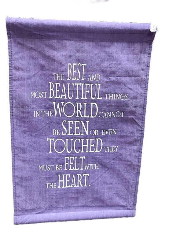 Purple fabric with white text quote on a white background