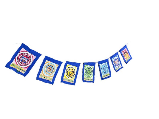 Set of colorful prayer flags with various symbols on a white background