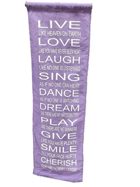 Purple towel with motivational quotes on a white background