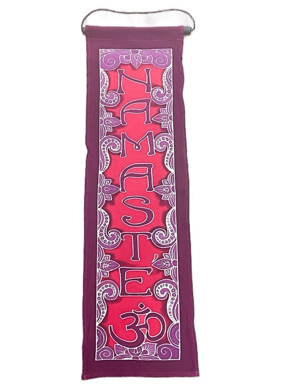 Decorative towel with 'Namaste' and 'Om' symbols on a white background