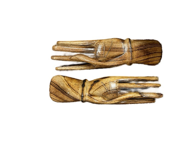 Wooden claw-like gloves on a white background