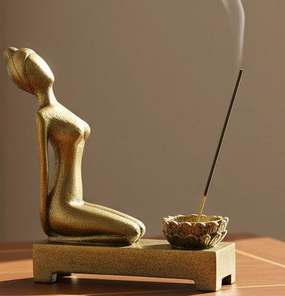 Yoga hero pose candle holder