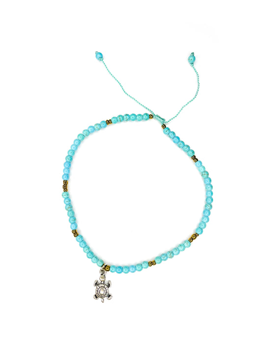 Anklet with turquoise stone and turtle